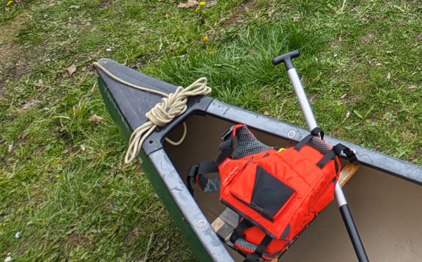 safety rope securely tied to the stern of a canoe